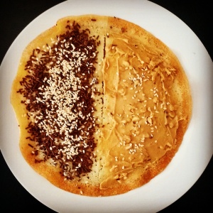 Sweet martabak with peanut butter, chocolate sprinkles and sesame seed
